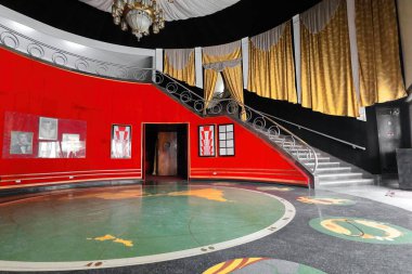 Havana, Cuba-October 26, 2019: Lobby of the AD 1941 opened, Art-Deco Teatro America Theater set within the Edificio Rodriguez Vazquez Building, seen from its open doors on 253 Calle Galiano Street,. clipart