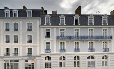 Napoleon III-style building from the 1880s, north front facing the rampart seen from the patrol path, Saint-Malo intra-muros town. Brittany-France-207 clipart