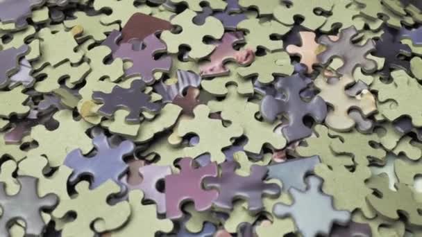 Hintergrund Der Farbigen Puzzleteile Rotierend Draufsicht Textur Des Unfertigen Puzzles — Stockvideo