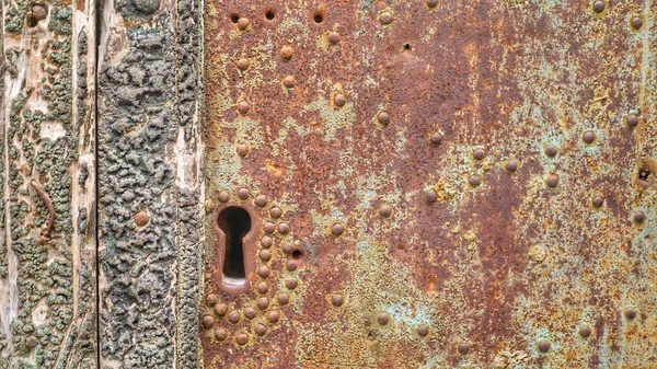Velho Buraco Fechadura Enferrujado Uma Porta Ferro Enferrujado — Fotografia de Stock