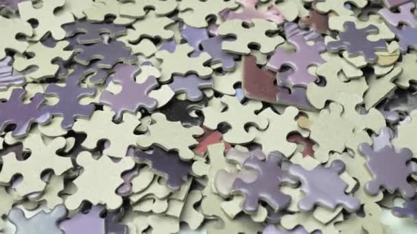 Background Colored Puzzle Pieces Slowly Rotating Puzzles Purple Tones — Stock Video