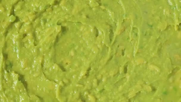 Polpa Abacate Verde Fresca Gira Fundo Textura Purê Abacate Cru — Vídeo de Stock