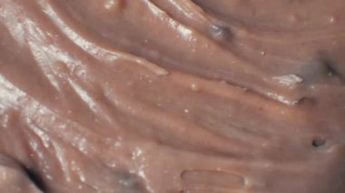 Güzel Dalgalı Çikolata Yakın Çekim Üç boyutlu Animasyon Yavaş Hareket. Gerçekçi Çikolata Kahverengi Renk Yapıştırıcısı Döndürülebilir Döndürülebilir Makro 4k.