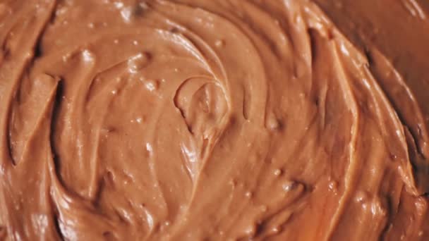 溶かしたプレミアムチョコレートトップビューの回転 菓子の概念 — ストック動画