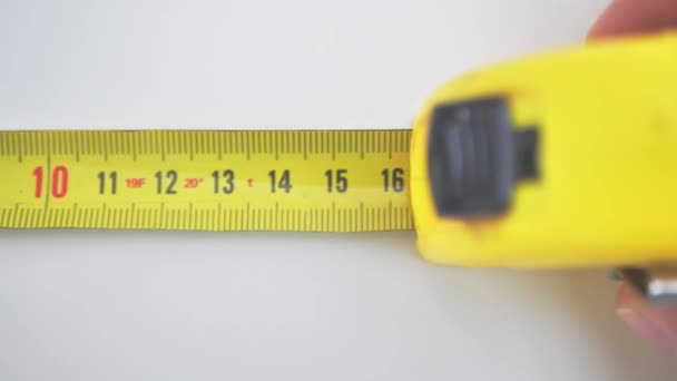 Yellow Tape Measure Roll Measuring Tape — Stock Video