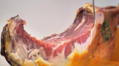 Jamon Serrano. Traditional Spanish ham close-up. Sliced Jamon Iberico. Close-up of prosciutto