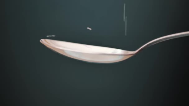 Pouring Sugar Spoon Black Background Close — Stockvideo