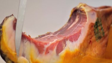 Jamon Serrano. Traditional Spanish ham close-up. Sliced Jamon Iberico. Close-up of prosciutto