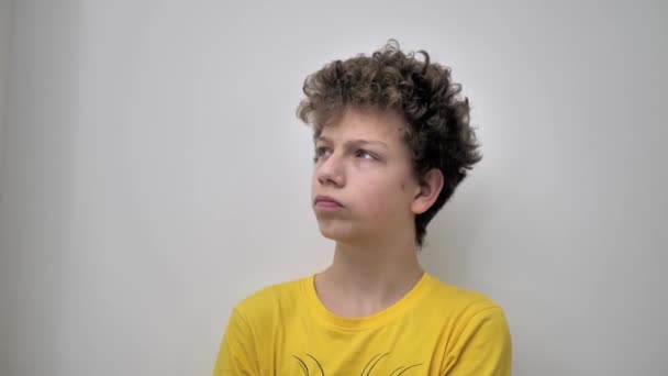 Curly Haired Teenager Showing His Emotions — Stockvideo