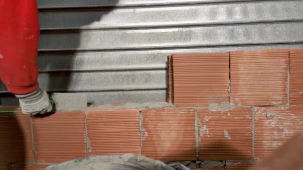 Close Masonry Construction Site Bricklayer Works Trowel Puts New Brick — Stockvideo