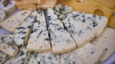 Sliced pieces of Roquefort cheese. Close-up.