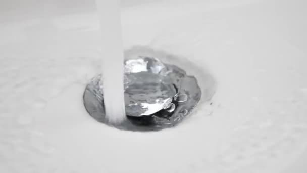 Water Flows Sink Drain Hole Slow Motion Water Drain Ceramic — Stockvideo