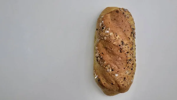 Assortment Baked Bread White Background Fresh Fragrant Bread Nutrition Concept — Zdjęcie stockowe