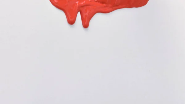 Pintura Roja Extiende Sobre Fondo Blanco Copiar Espacio — Foto de Stock