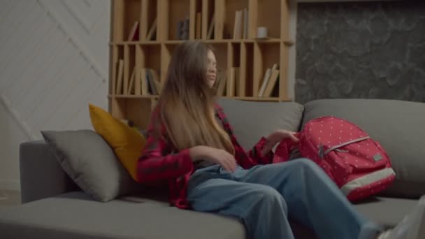 Lovely Positive Hispanic Teenage Girl Backpack Homecoming Study Lying Sofa — Stock Video