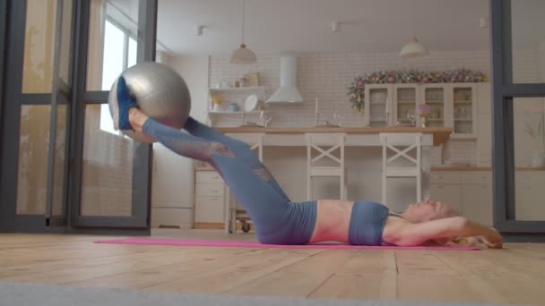 Active Charming Sporty Fit Mature Female Working Out Stability Ball — Stock Video