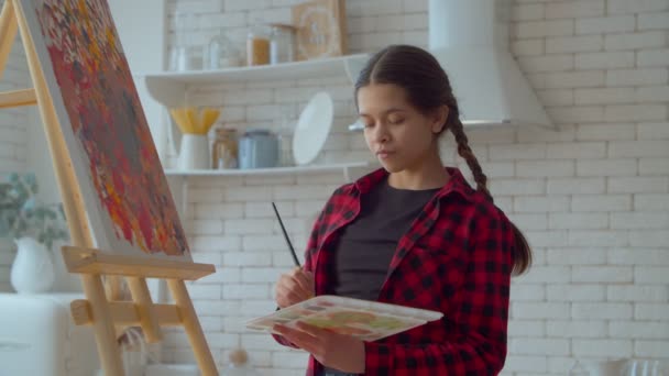 Engrossed Creative Process Talented Adorable Latin Teen Girl Pigtails Expressing — Vídeo de stock
