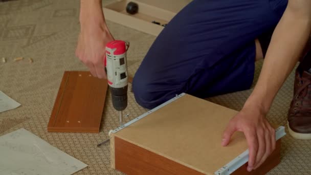 Close Handyman Installing Self Closing Drawer Slide Tightening Self Tapping — Stock Video