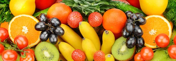 Beautiful background of vegetables and fruits. Wide photo.