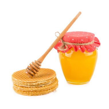 Honey and waffles isolated on white background.