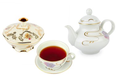 Vintage candy bowl, tea cup and teapot isolated on white background. Collage.