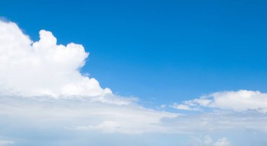 Blue sky and beautiful white clouds. Wide photo. clipart