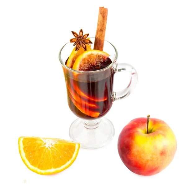 Mulled wine, orange and spices isolated on white background.