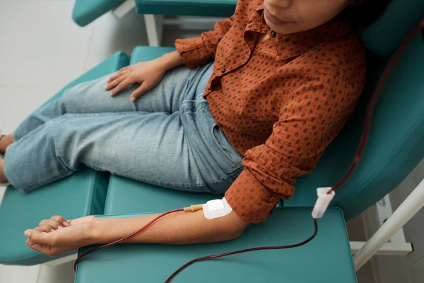Young Female Giving Her Blood Sick Patients Dropper Tube Connected — стоковое фото