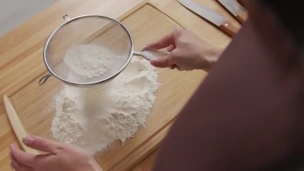 Shoulder Shot Woman Sifting Flour Wooden Board While Preparing Ingredients — Vídeo de Stock