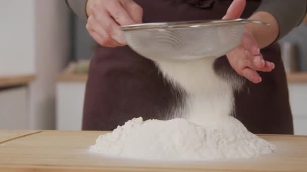 Close Shot Hands Woman Sifting Flour Wooden Board While Baking — Stockvideo