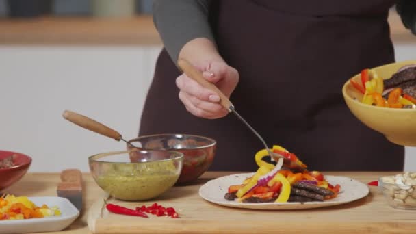 Close Tracking Shot Woman Putting Meat Strips Pepper Slices Flour — Stock videók