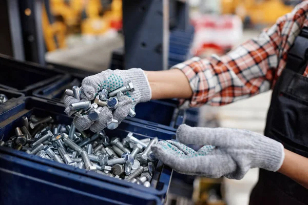 Gloved Hands Female Engineer Workwear Taking Pile Bolts Out Plastic — Stockfoto