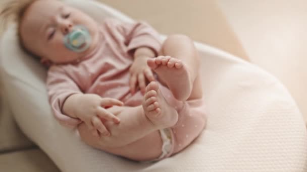 Selective Focus Feet Cute Blue Eyed Biracial Infant Pink Onesie — Video Stock