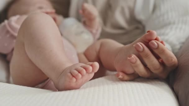 Selective Focus Cropped Mother Holding Foot Her Baby Girl Home — Vídeo de Stock
