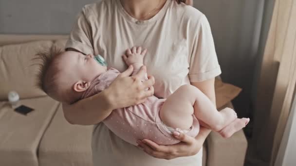 Midsection Cropped Female Parent Holding Sleeping Baby Daughter Pacifier Standing — Stock Video