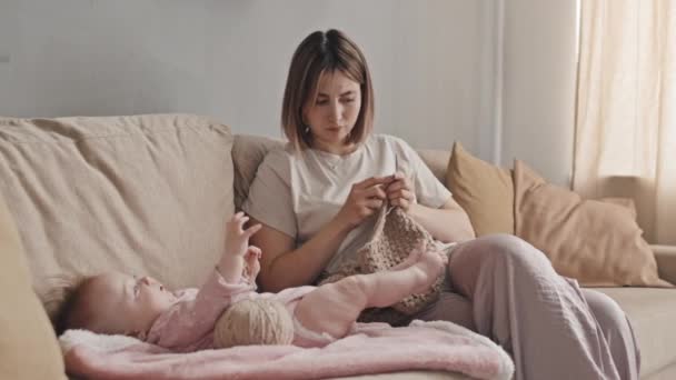 Medium Long Brown Haired Biracial Woman Loungewear Sitting Sofa Home — Vídeo de Stock