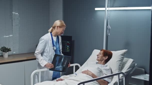 Locked Blonde Mature Female Doctor Wearing Medical Gown Walking Hospital — Stok video