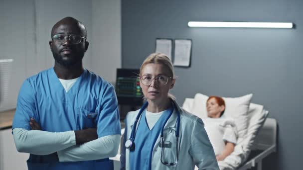 Portrait Blonde Caucasian Female Doctor Black Male Nurse Scrub Suit — Stockvideo