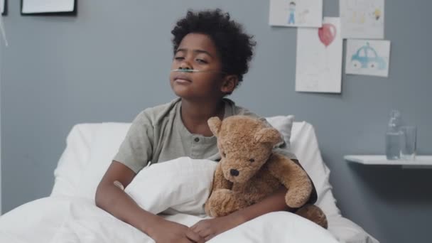 Medium Portrait Happy African American Boy Oxygen Tube Nose Sitting — Video Stock