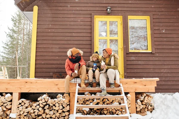 Happy Young Family Three Sitting Wooden Porch Countryhouse Having Hot — Foto Stock