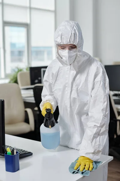 Contemporary Young Cleaning Service Worker Sprayer Disinfecting Desks Wiping Surfaces — Stok fotoğraf