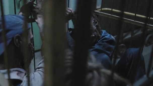 Angry Zombies Captured Cage Locked Handcuffs Dark Basement Old Building — Vídeo de Stock