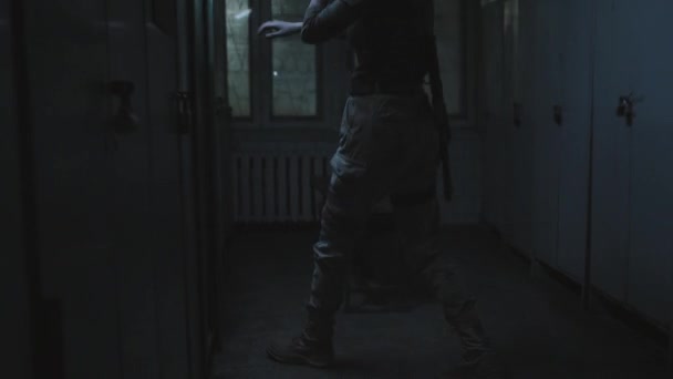 Young Female Soldier Shaved Head Holding Flashlight Looting Abandoned Dark — Stock videók