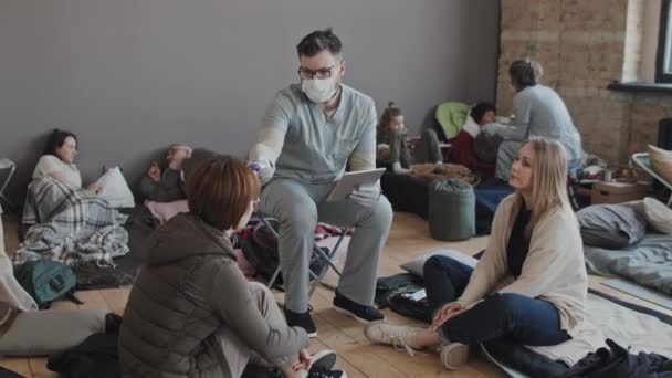 Full Shot Male Caucasian Nurse Scrub Suit Face Mask Checking — Stok video