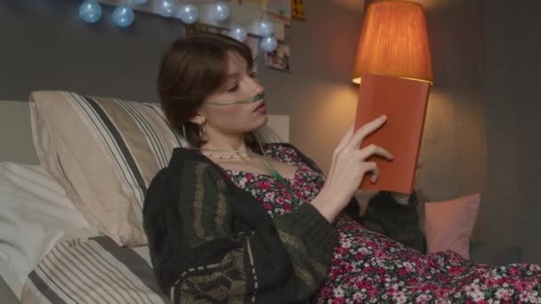 Tilting Caucasian Teenage Girl Nasal Cannula Chronic Disease Lying Bed — Stockvideo