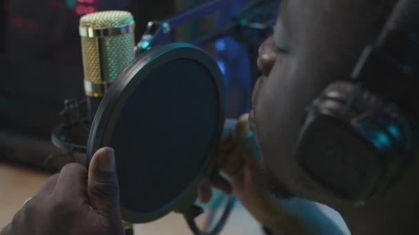 Close Side Shot Face Young Black Man Headphones Head Adjusting — Video