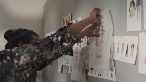 Male Indian Fashion Designer Attaching Sketch Wall Other Sketches Inspirational — Video Stock