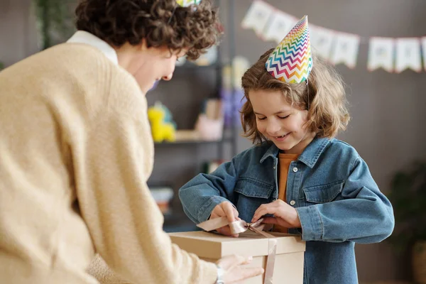 Happy Little Boy Party Hat Opening Gift Box Giving His — Stock Photo, Image