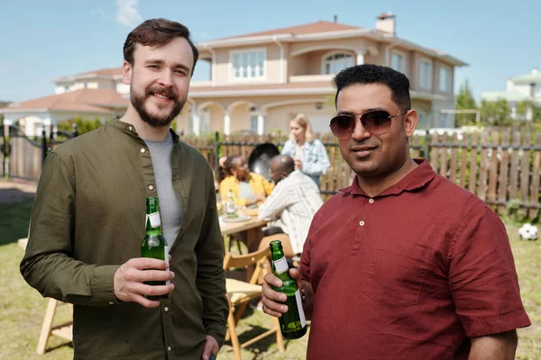 Happy Young Interracial Male Friends Bottles Beer Looking Camera While — Stock Photo, Image
