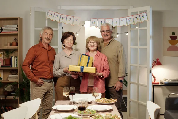 Group Four Happy Senior Friends Packed Giftboxes Looking Camera While — Stock Photo, Image